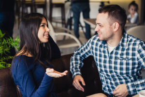 couple talking at cafe