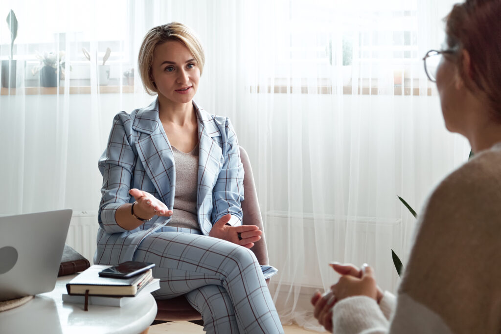 Young woman at a consultation with a counselor.